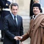 Two people shook hands for the camera.