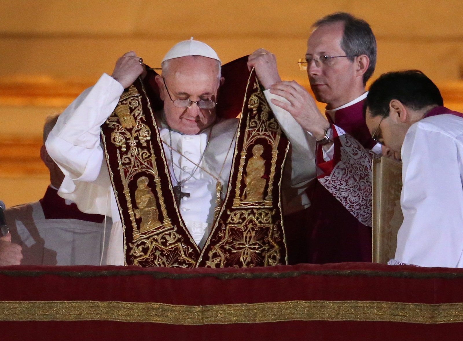 Images may contain Francis Guido Marini accessories glasses adult watch clothing hat pope and jewelry