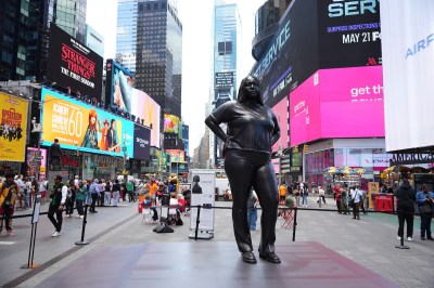 Sculpture of black women in Times Square.