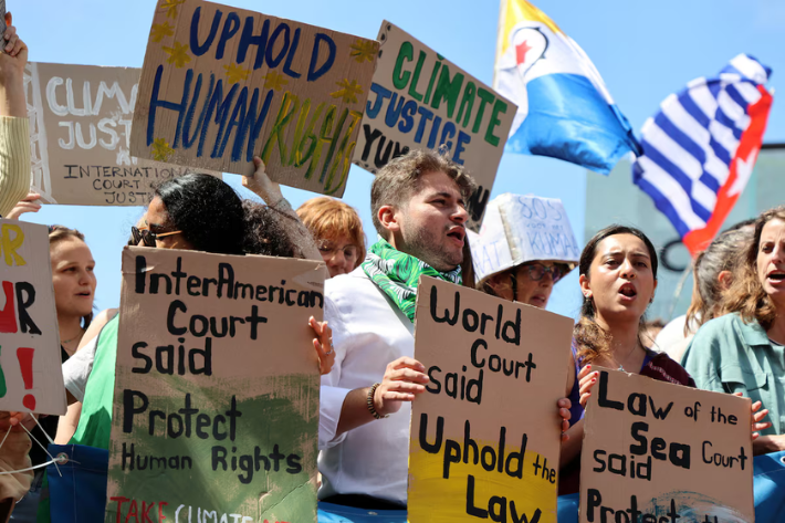 Before reading the advisory comments, climate activists and activists are presented outside the International Court of Justice (ICJ), which may determine the process of future global climate action, The Hague, Netherlands, July 23, 2025