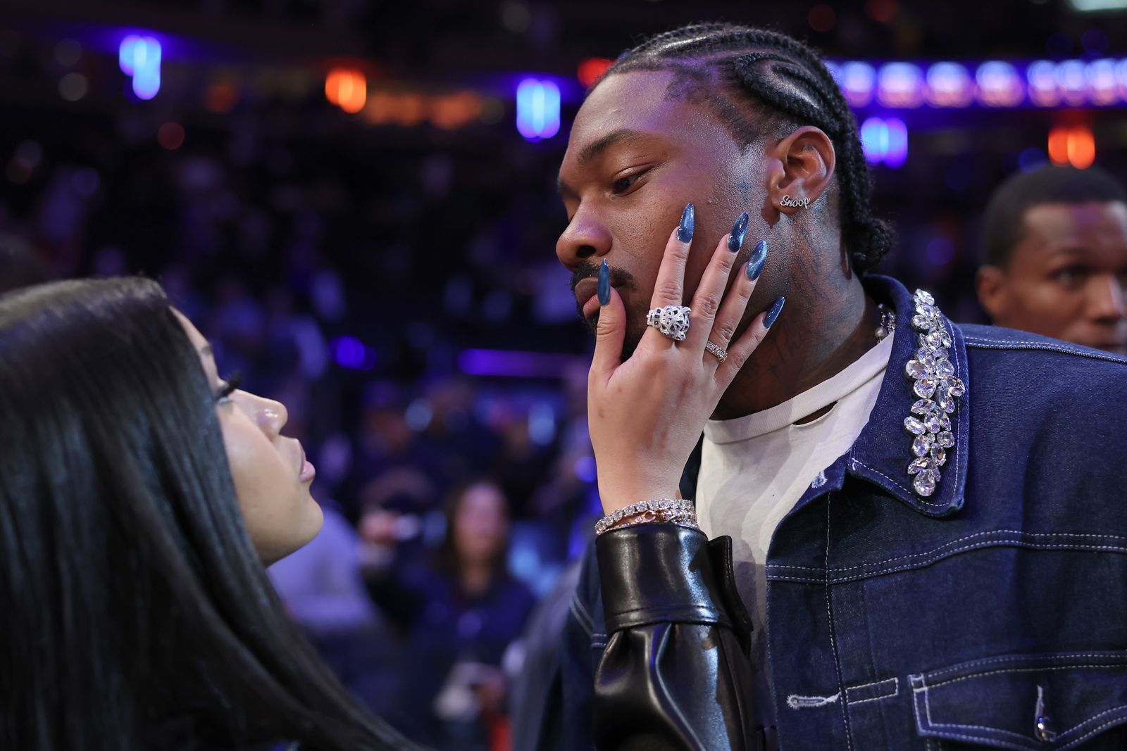 NFL player Stefon Diggs and rapper Cardi B celebrate Game 4 of the Eastern Conference second round NBA...