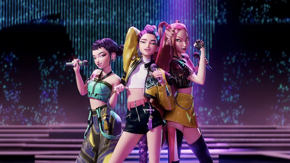 K-Pop Group Huntrix sings animated members on stage.