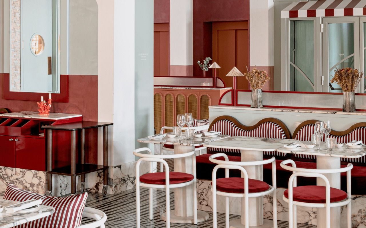Images may contain architectural dining table furniture indoor dining table dining table and chairs